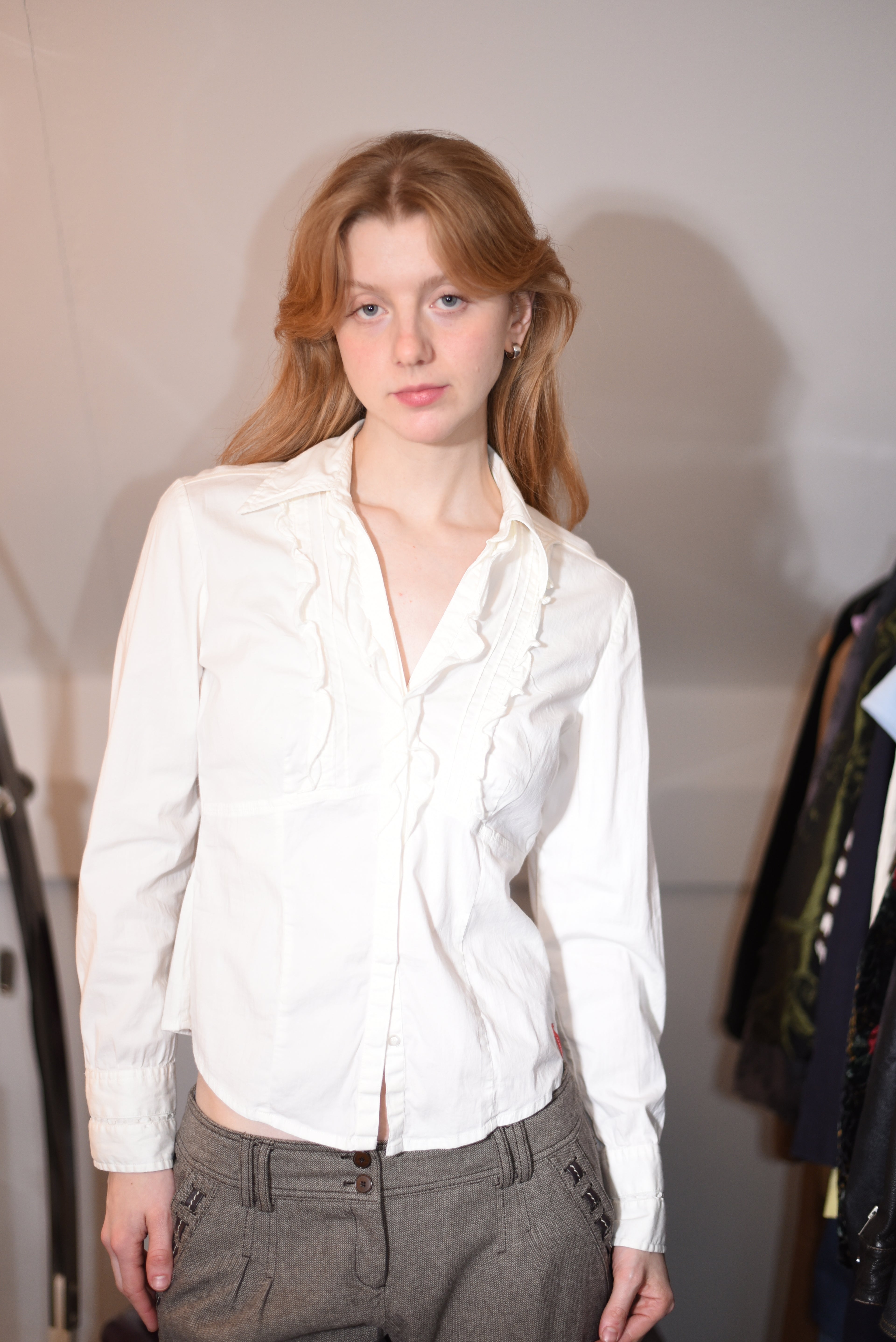 White ruffled blouse