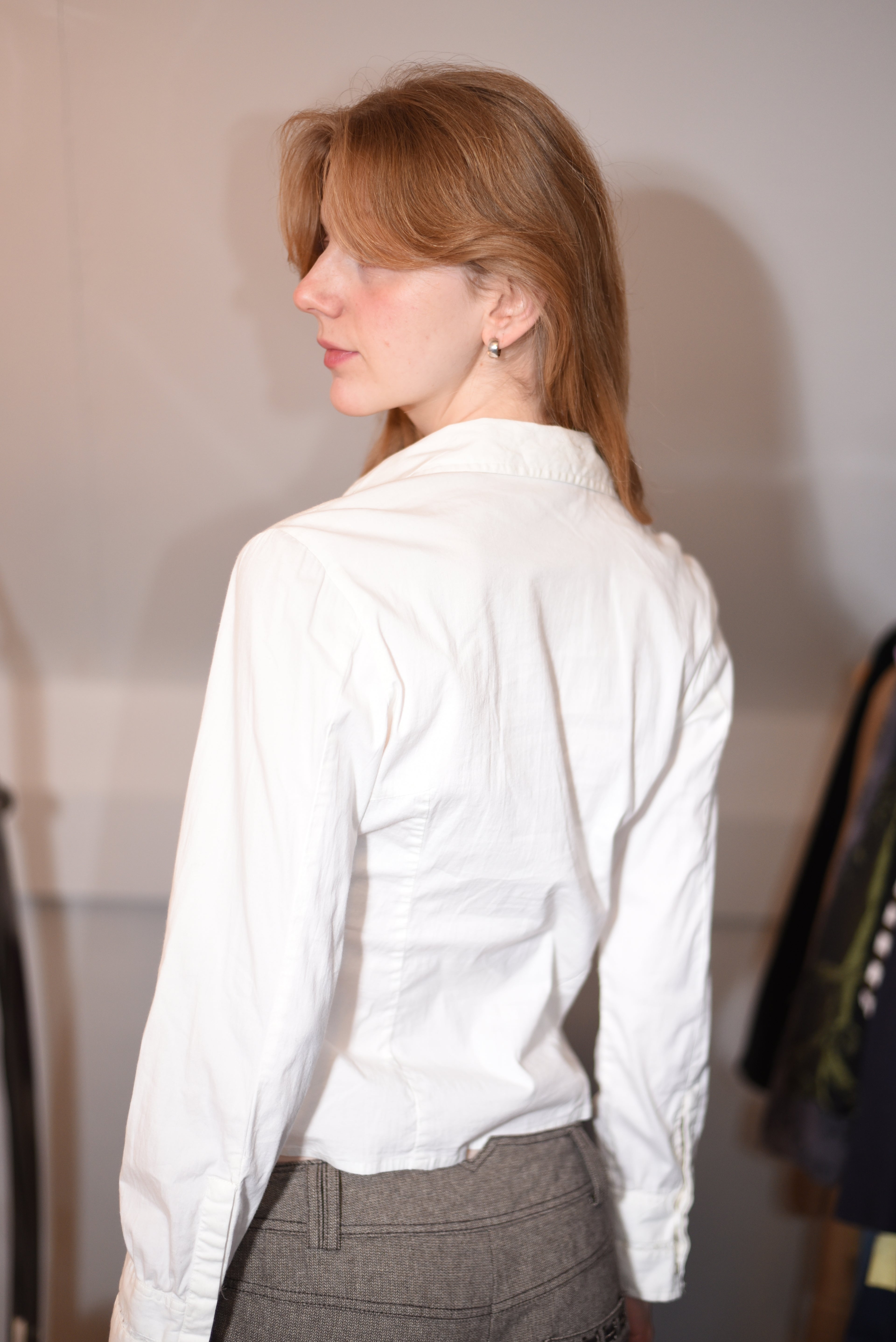 White ruffled blouse