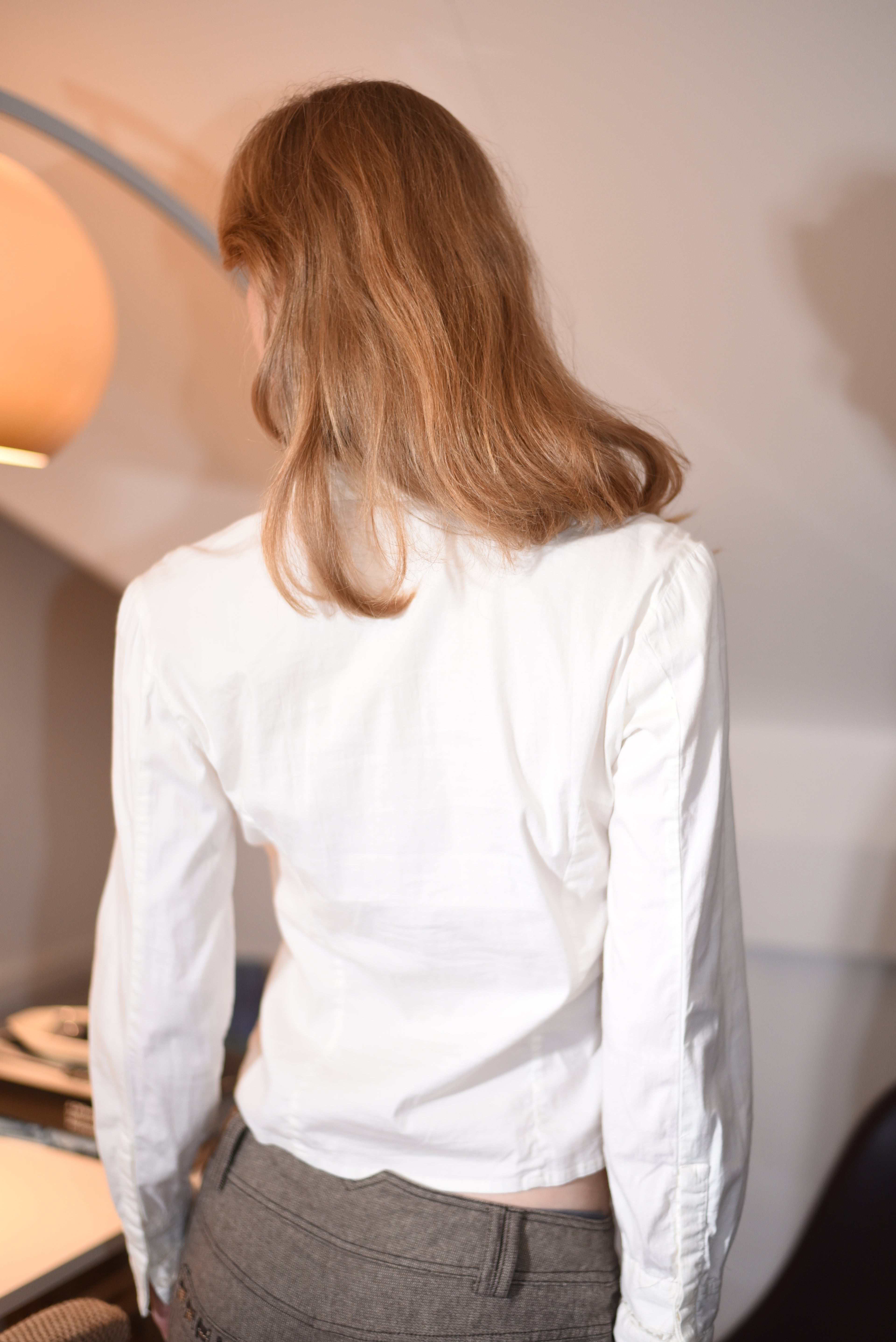 White ruffled blouse