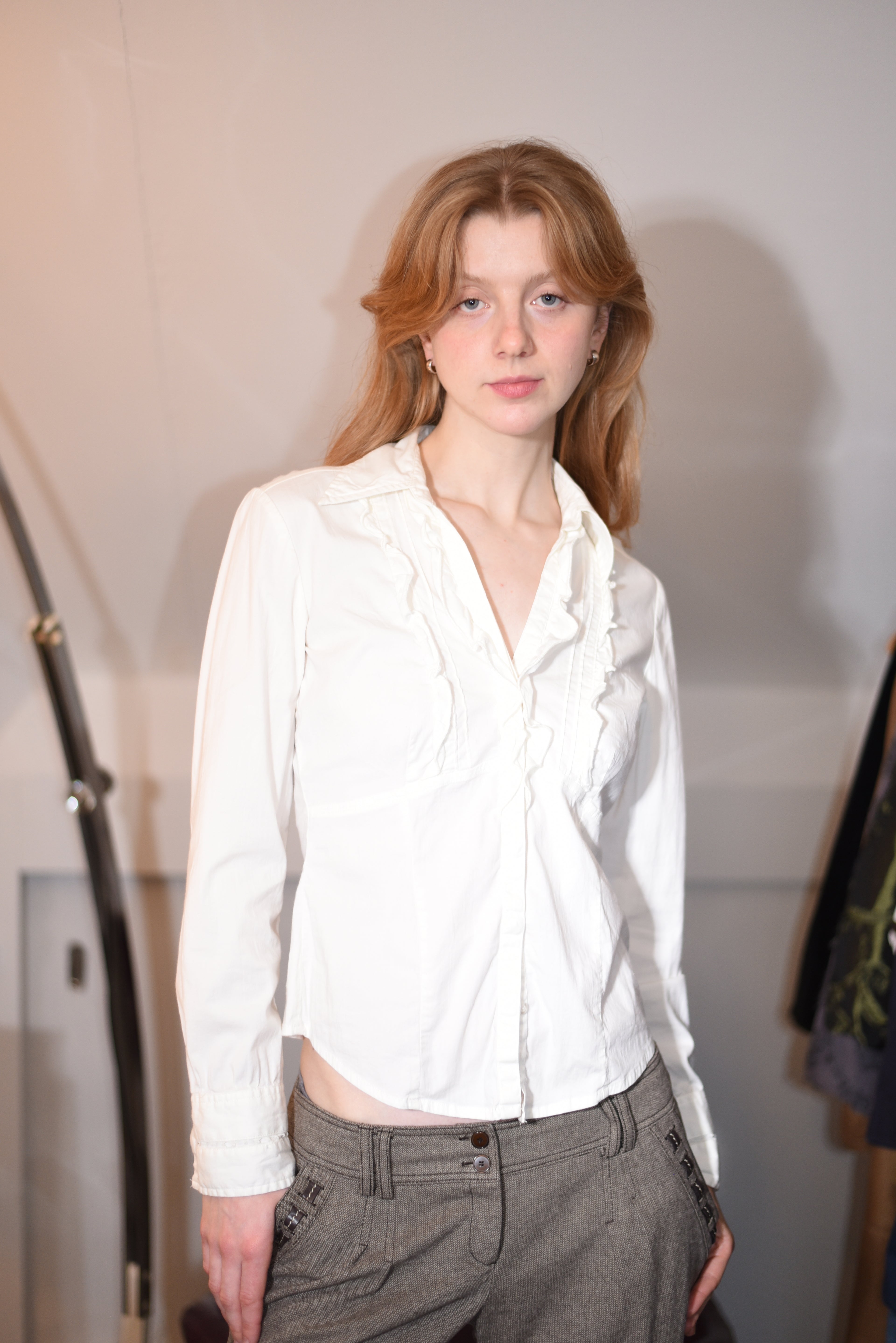 White ruffled blouse