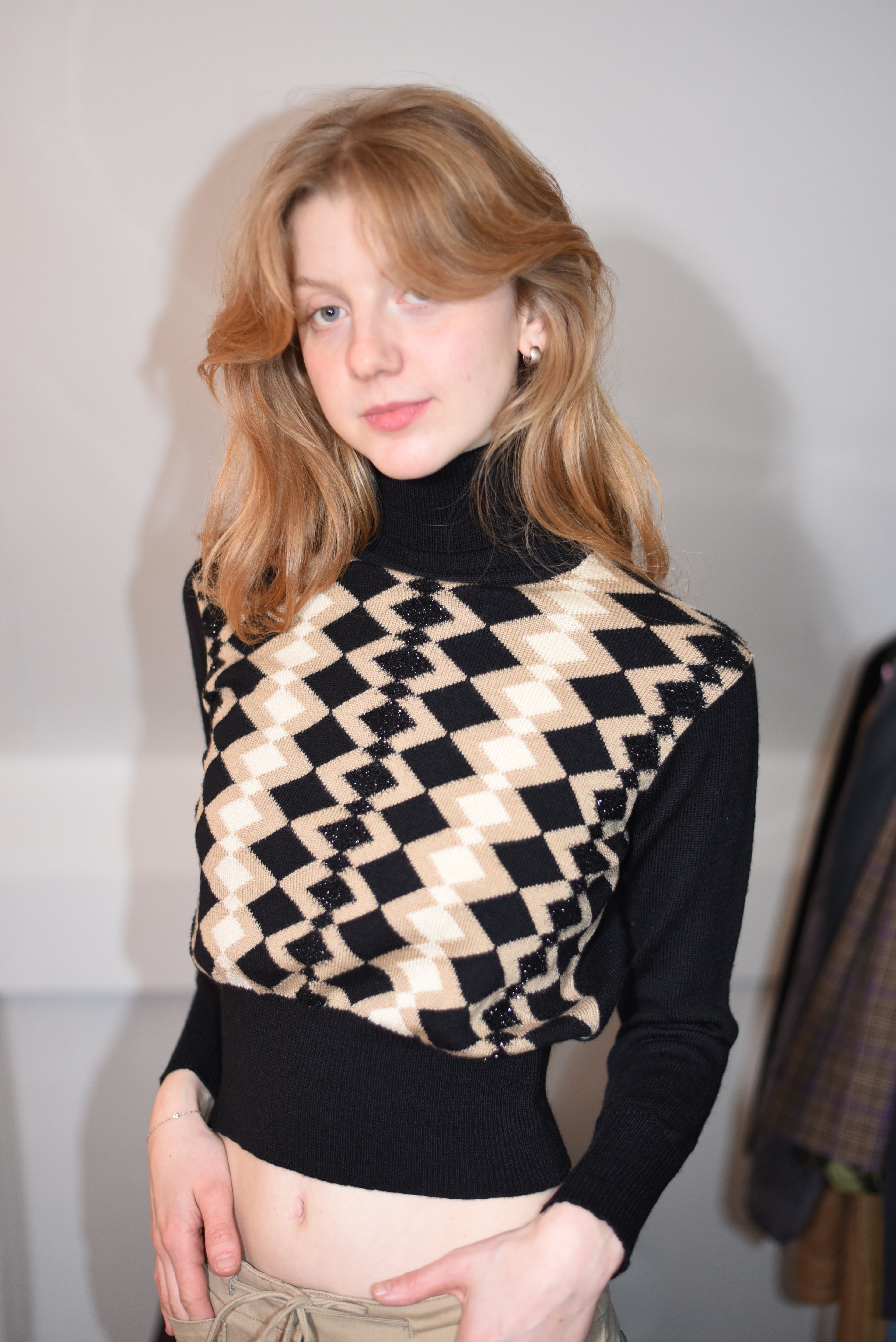 Black and beige geometric knit turtleneck