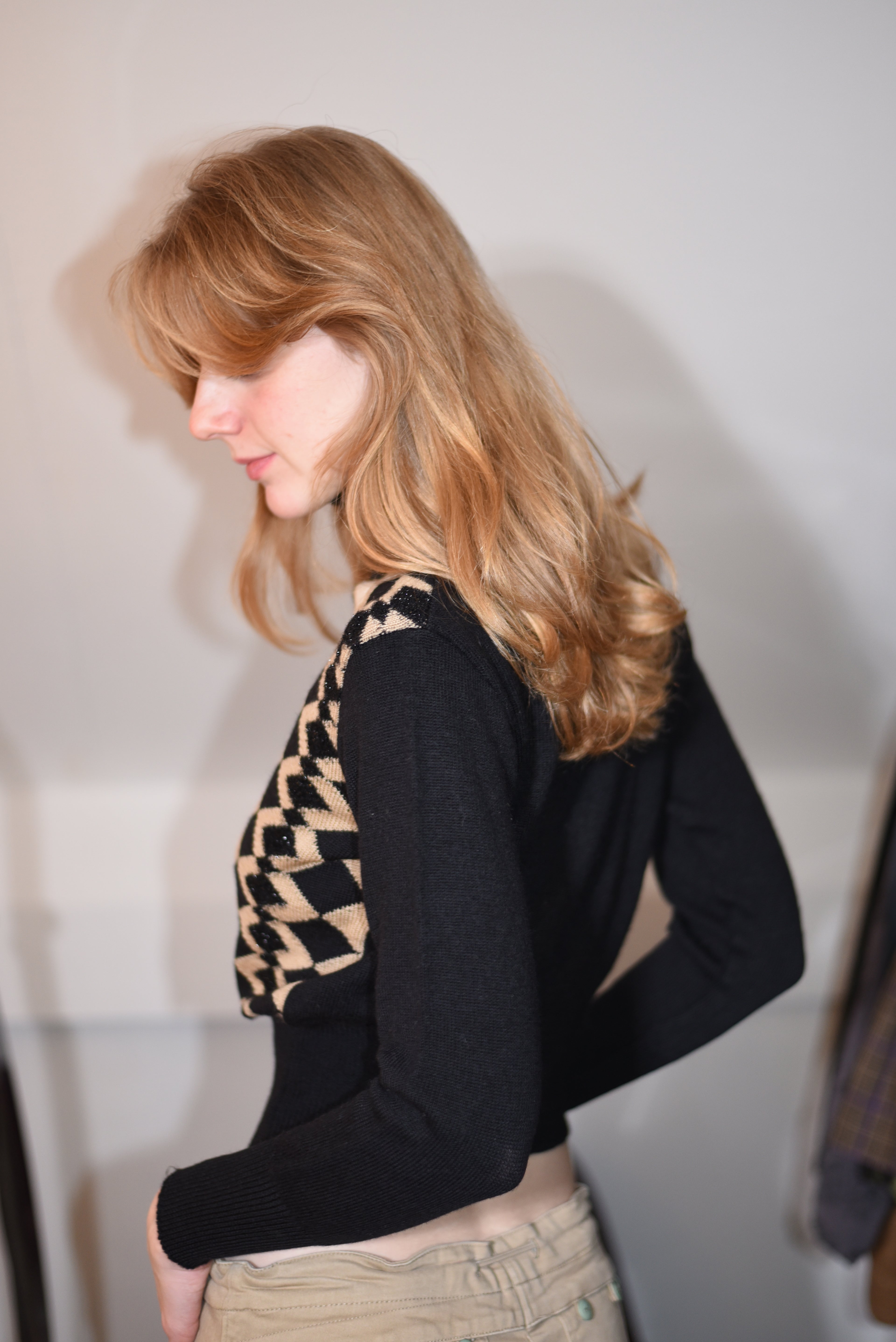 Black and beige geometric knit turtleneck