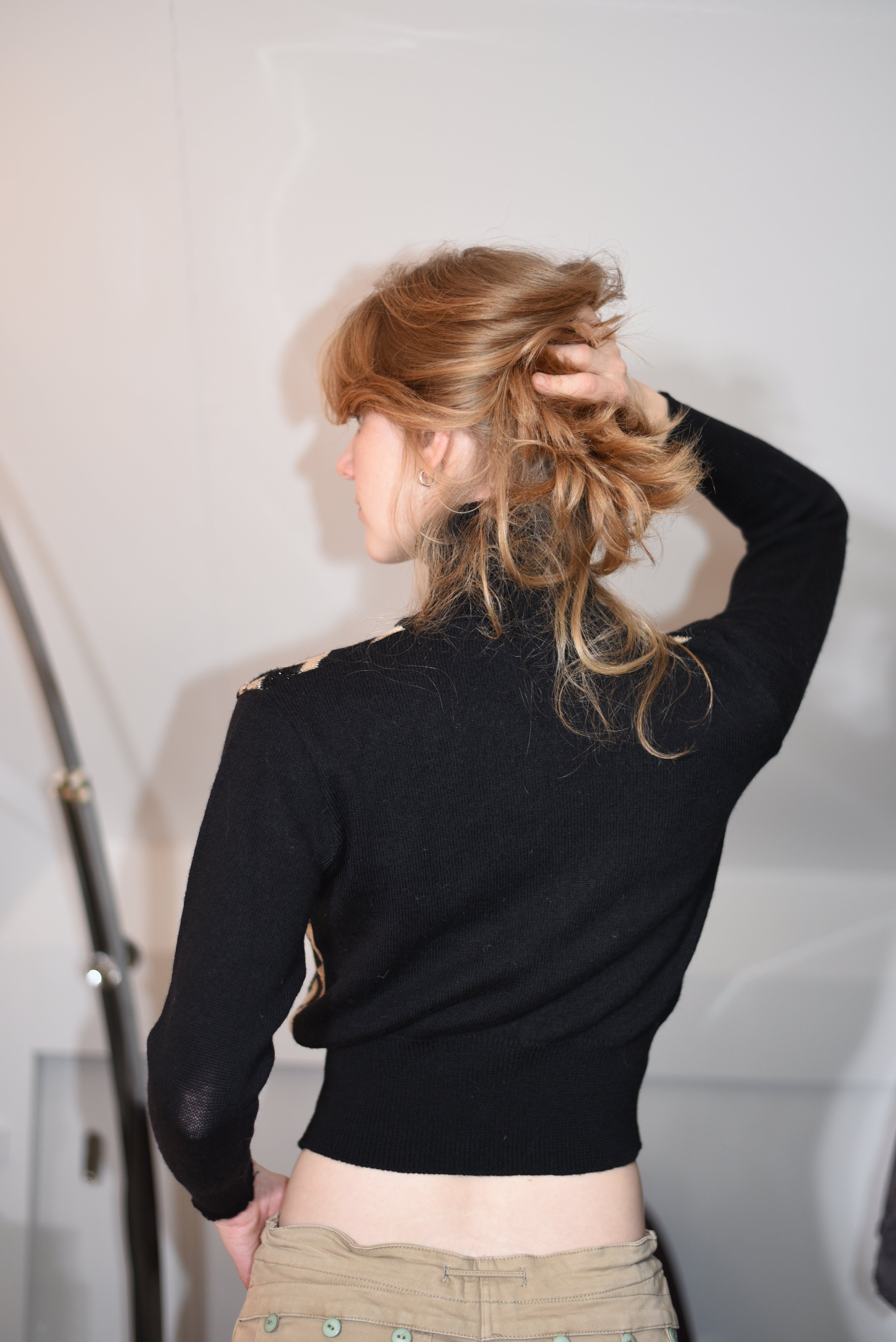 Black and beige geometric knit turtleneck