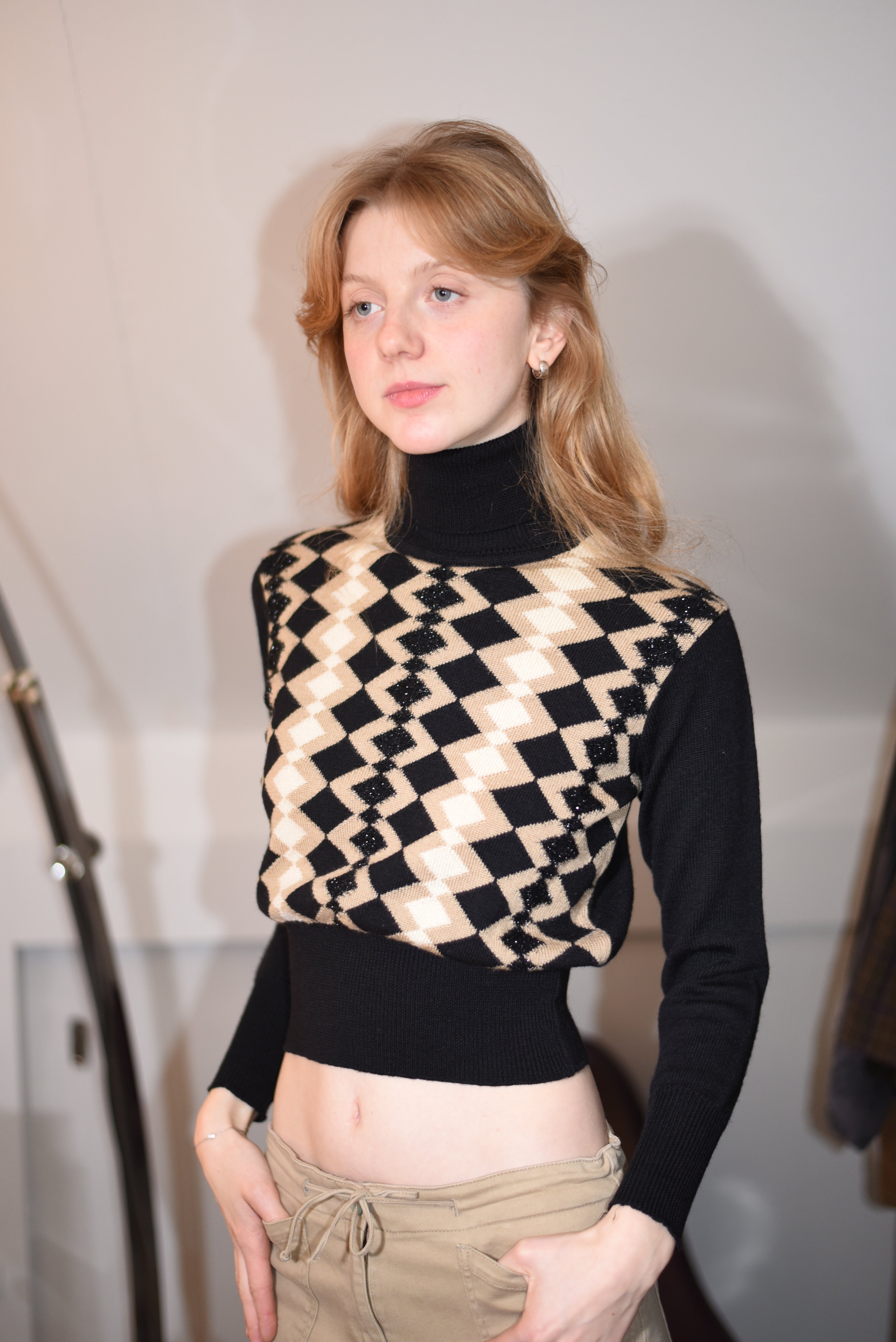 Black and beige geometric knit turtleneck